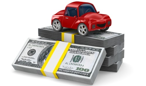 bigstock-Red-car-on-dollars-Isolated-24560987-e1380175709657